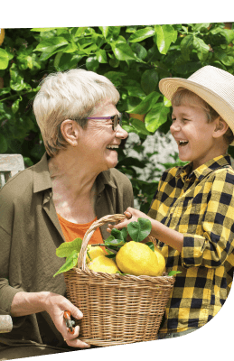 Elderly Woman Gardening With Young Child Outdoors Independent Living Community Elderly Woman Gardening With Young Child Outdoors Independent Living Community
