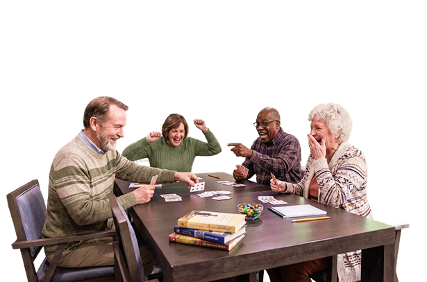 Elderly Residents Playing Cards in Activity Room Independent Living Facility Elderly Residents Playing Cards in Activity Room Independent Living Facility